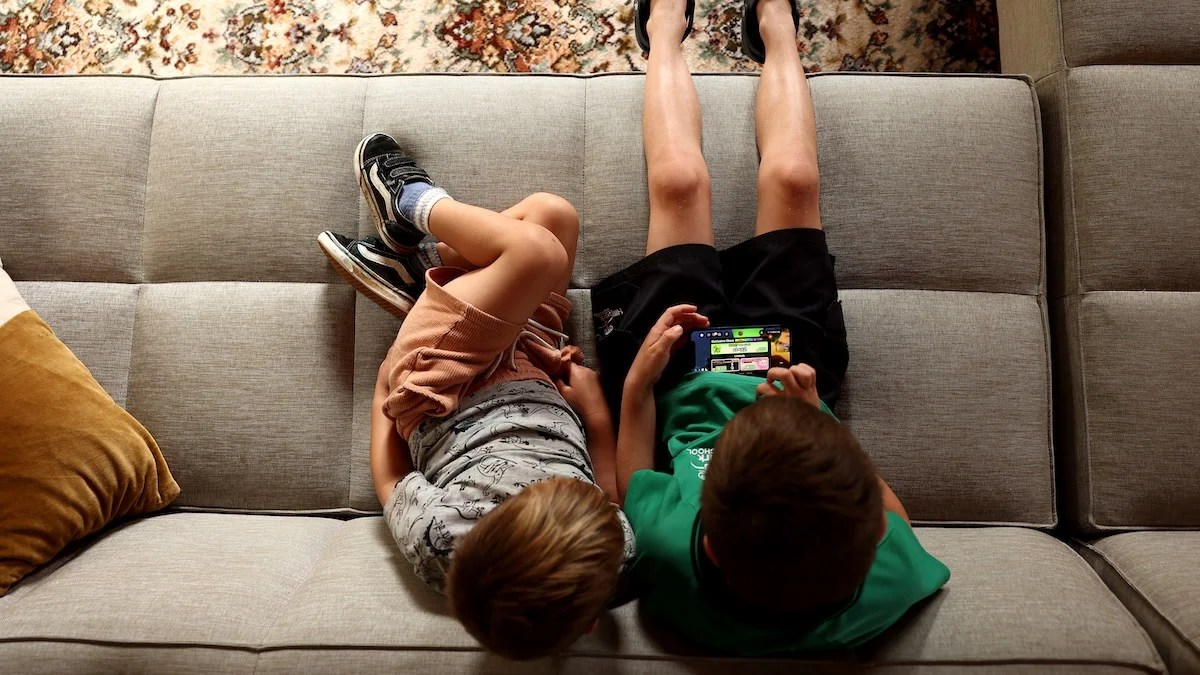 Kids playing on a phone